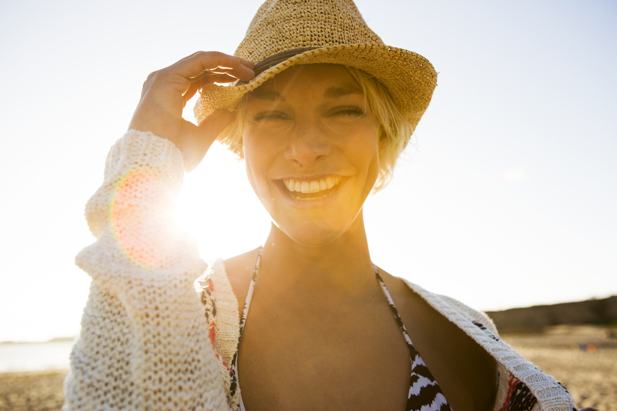 A Happy Woman At The Beach.